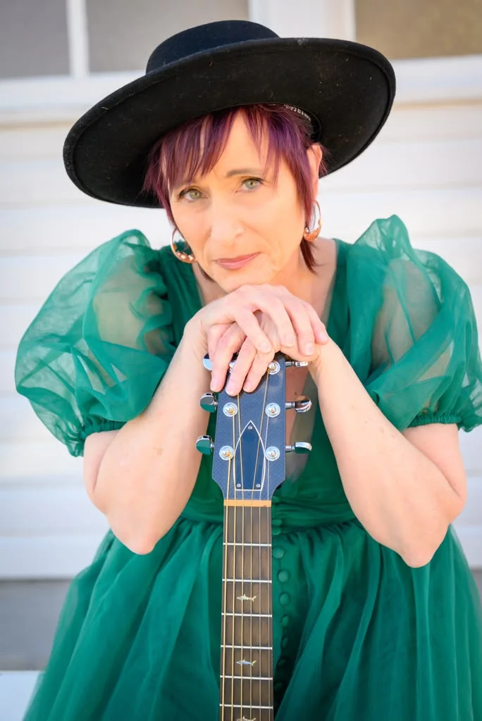 Randie O'Neil with her guitar